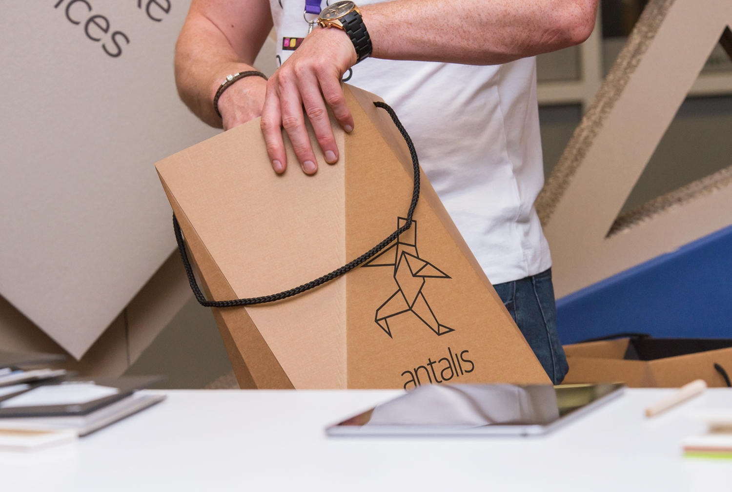 Packaging design and custom carrier bag made with cardboard by Design Project