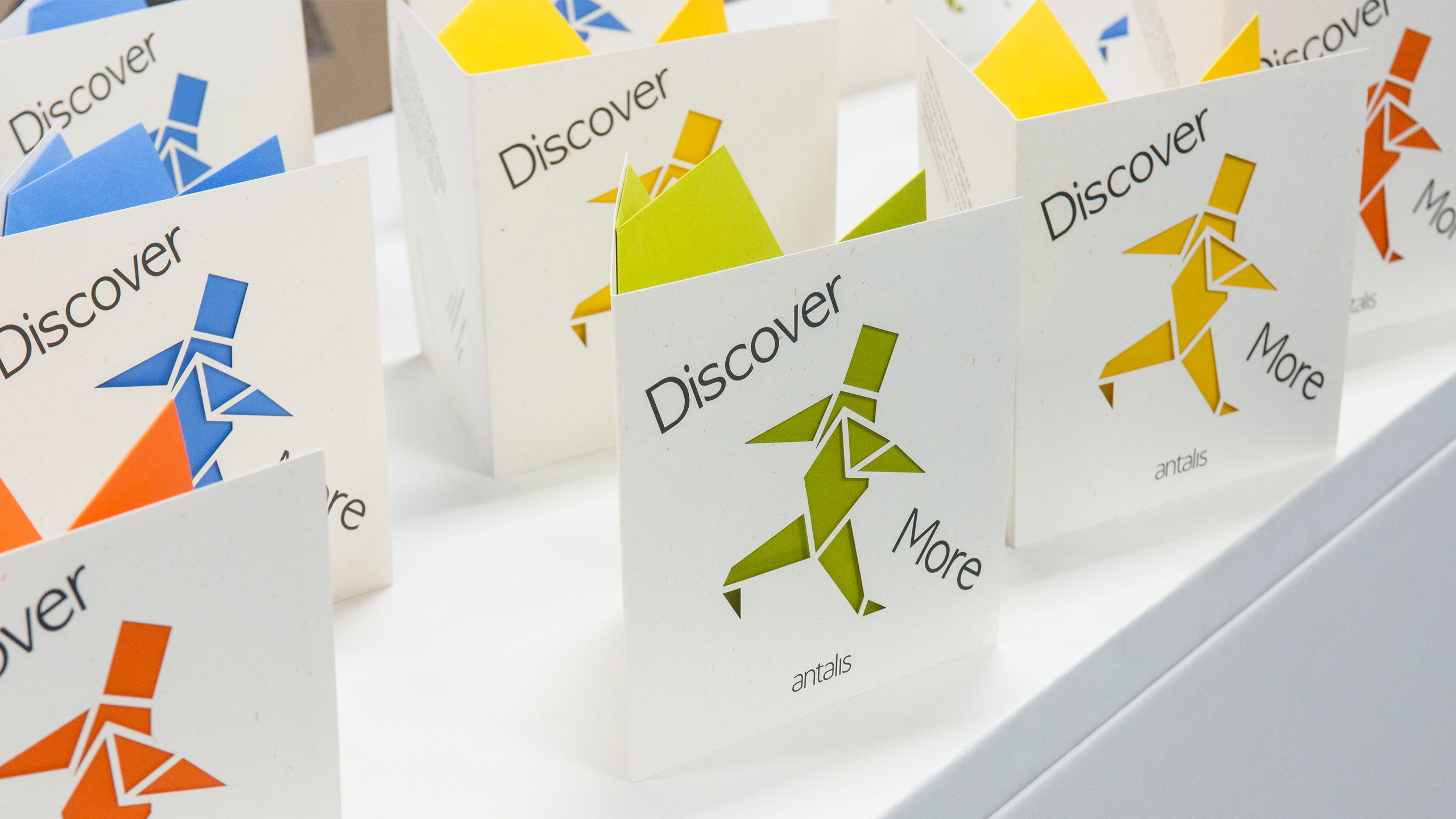 Promotional leaflet design, with laser-cut cover using creative papers by Design Project
